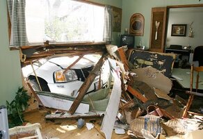 Top Photos 8  --vehicle smashes into home 2--  02-25-10.jpg