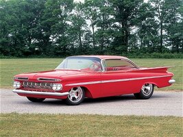 0511cr_01z+1959_Chevrolet_Impala+Two_Door_Red_Body_Driver_Side_Front_View.jpg