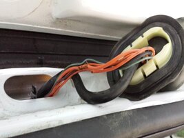 truck rear hatch frayed wires.jpg