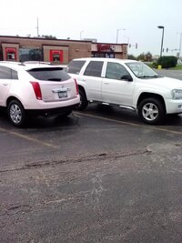 pink caddy next to.JPG