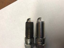 old and new spark plugs.jpg