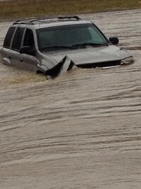 vehicle in flood water.jpg