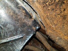 Inner fender broken loose...