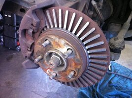 brake-rotor-worn-through.jpg