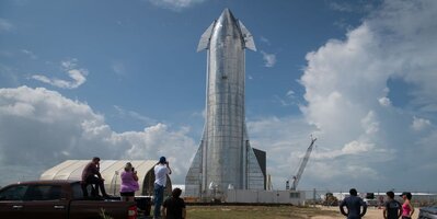 space-enthusiasts-look-at-a-prototype-of-spacexs-starship-news-photo-1571686996.jpg