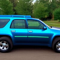 a_2002_Chevrolet_Trailblazer_in_profile_with_a_blue_and_green_iridesce_S9612897_St50_G7.5.jpeg